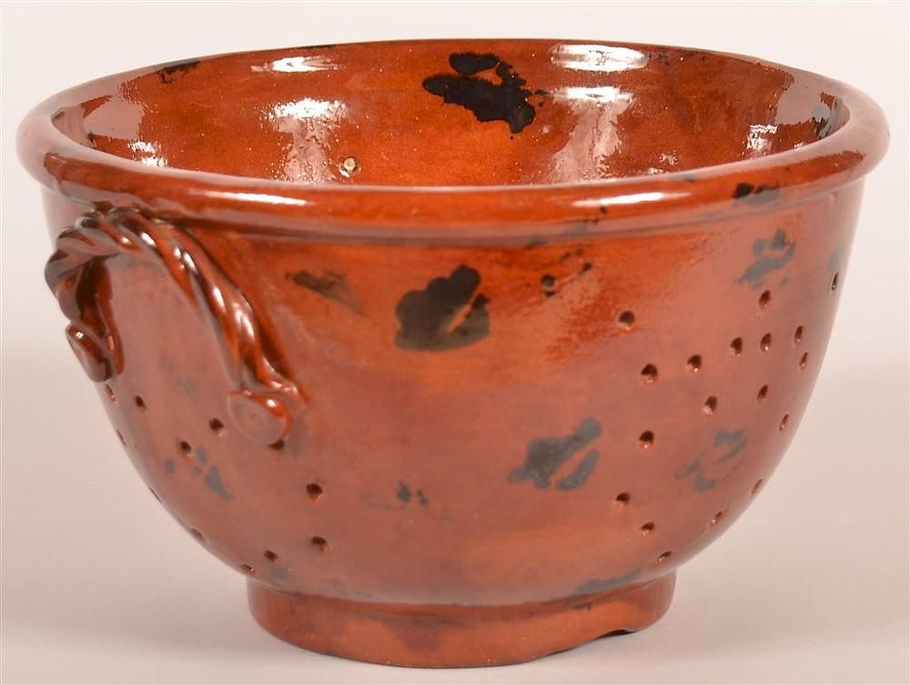 Appraisal: Breininger Redware Mottle Glazed Colander Breininger Redware Mottle Glazed Colander