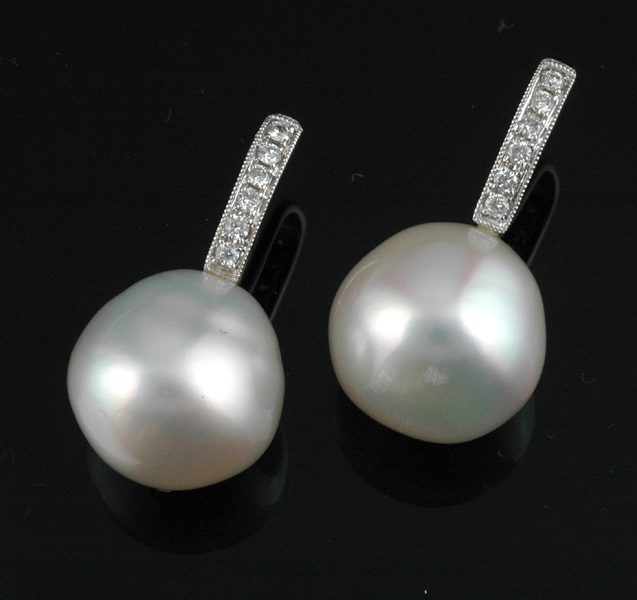 Appraisal: A PAIR OF SOUTH SEA PEARL AND DIAMOND DROP EARRINGS