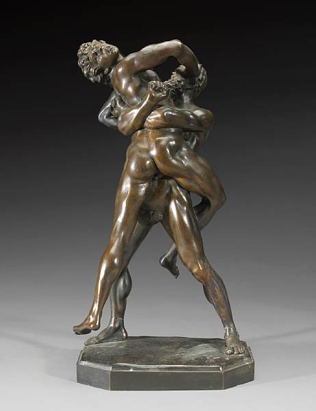 Appraisal: A patinated bronze group of two wrestlers cast after the