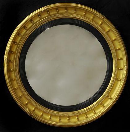 Appraisal: REGENCY GILTWOOD EBONIZED CIRCULAR CONVEX MIRROR Bearing label for Jackson