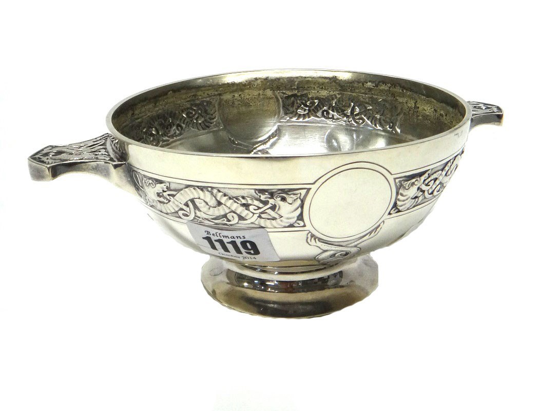 Appraisal: A Scottish silver twin handled quaiche shaped bowl decorated with