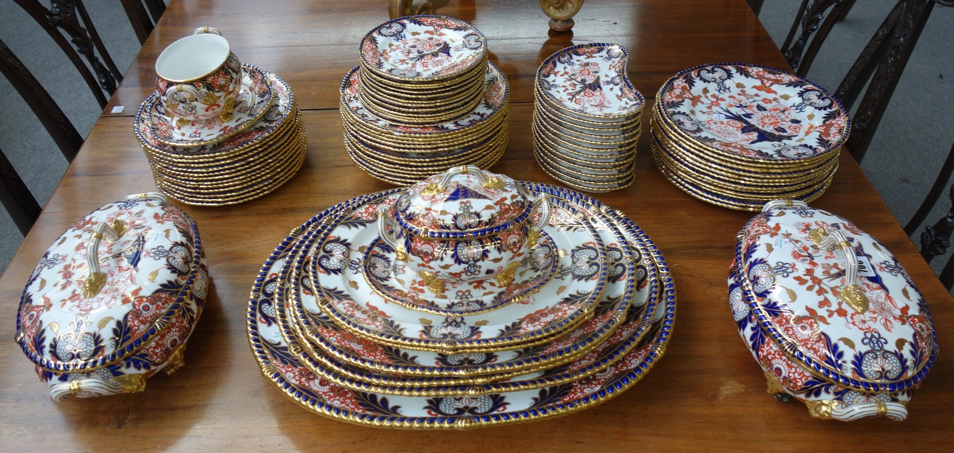 Appraisal: A Royal Crown Derby porcelain dinner service early th century