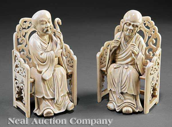 Appraisal: A Fine Pair of Chinese Ivory Figures of Lohans th