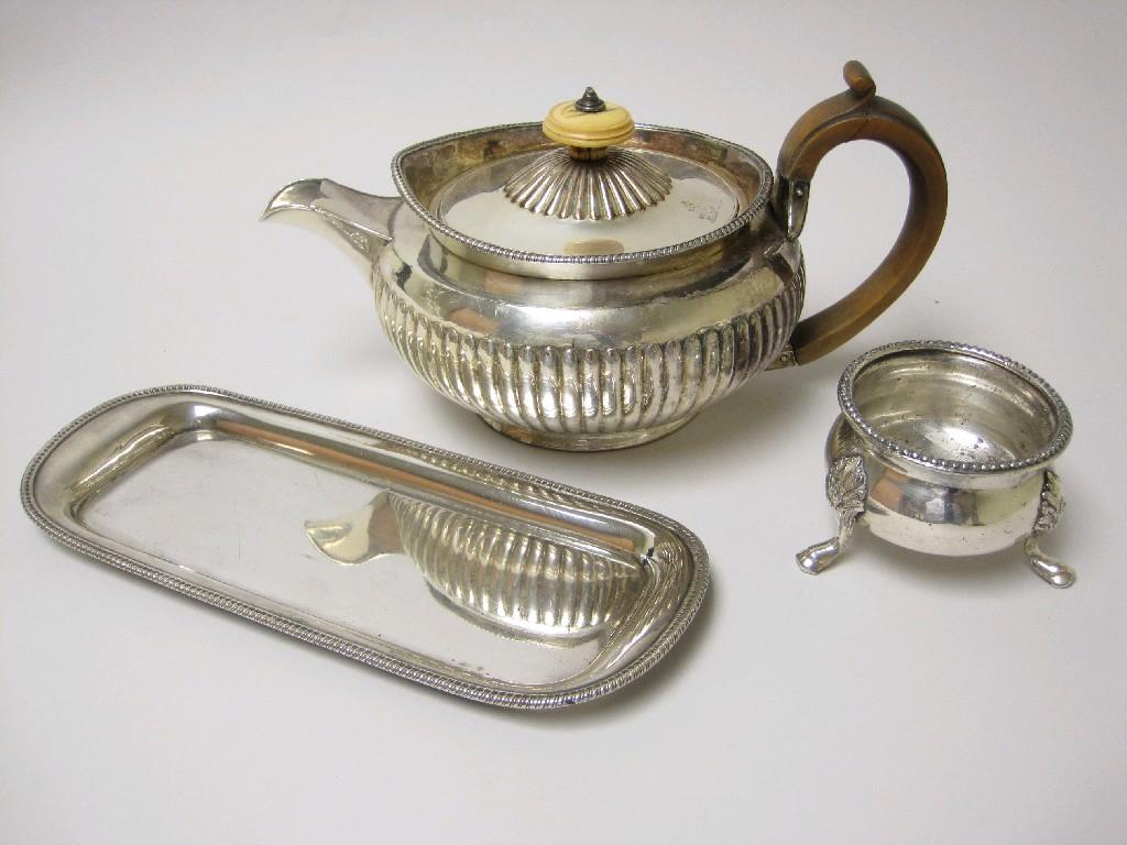 Appraisal: A Georgian Sheffield plated circular Teapot engraved with crest a