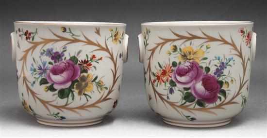 Appraisal: Pair of French floral decorated porcelain cachepots Estimate - All