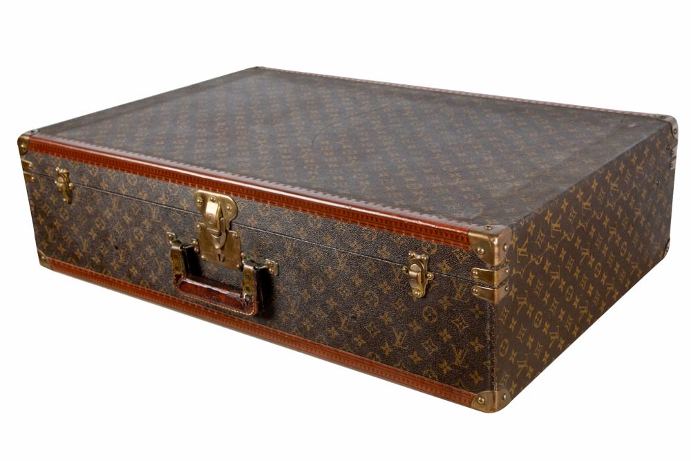 Appraisal: LOUIS VUITTON HARD CASE TRUNKinterior with original straps Provenance The