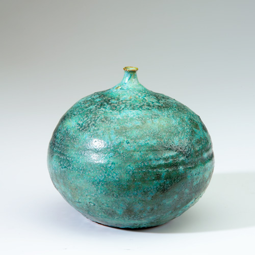 Appraisal: BEATRICE WOOD Spherical vessel with small opening covered in blue-green