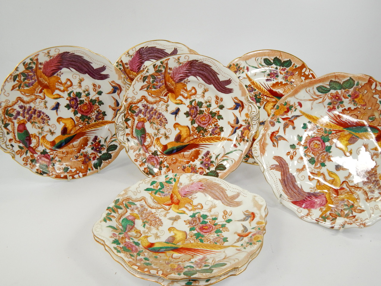 Appraisal: A set of seven Royal Crown Derby porcelain bread plates