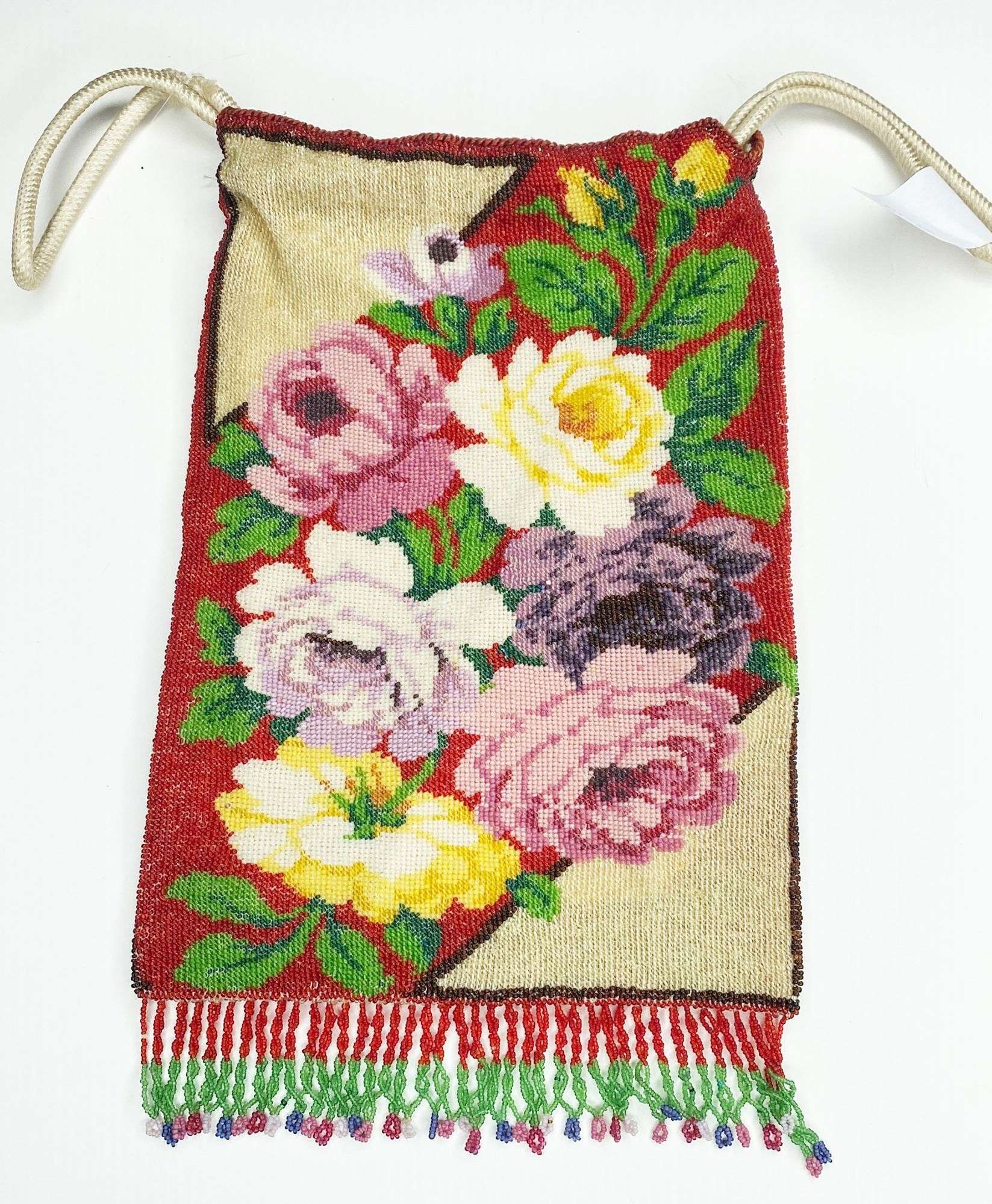 Appraisal: Micro Beaded Floral Draw String Hand Bag by at widest