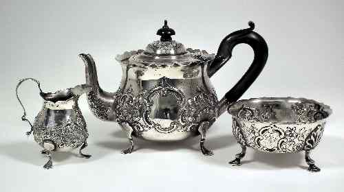 Appraisal: A George V silver circular teapot with wavy rim the