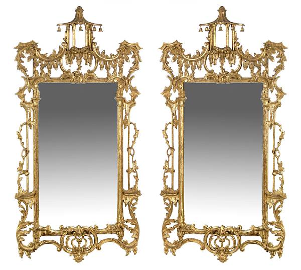 Appraisal: A pair of Chippendale style giltwood mirrors in the Asian