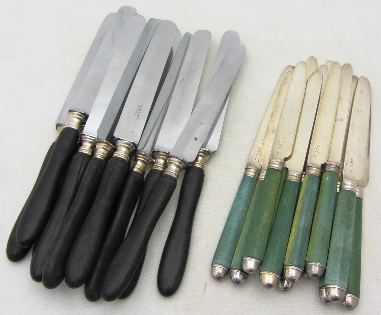 Appraisal: A set of twelve silver bladed dessert or fruit knives