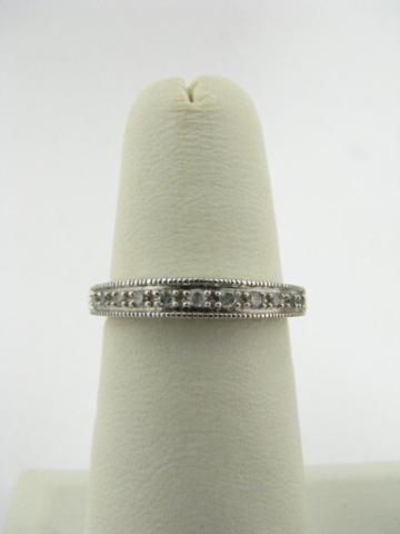 Appraisal: K white gold band with eleven diamonds size B