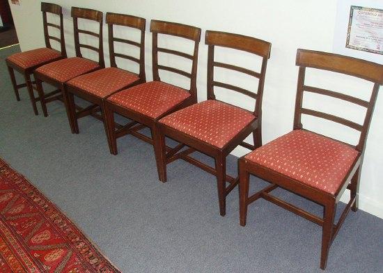 Appraisal: A set of six mahogany and inlaid dining chairs the