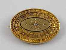 Appraisal: A Victorian yellow metal tests ct gold brooch decorated in