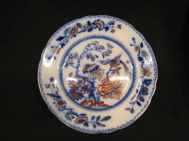 Appraisal: Early Davenport Ironstone Plate flow blue and polychrome bird and