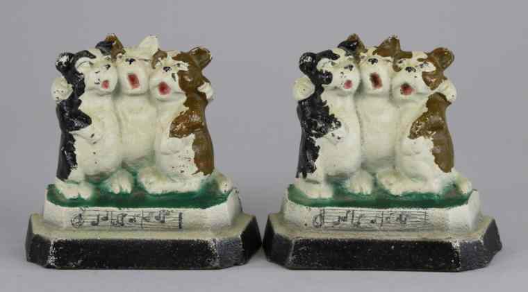 Appraisal: SINGING DOGS BOOKENDS Set of two bookends depicting an adorable