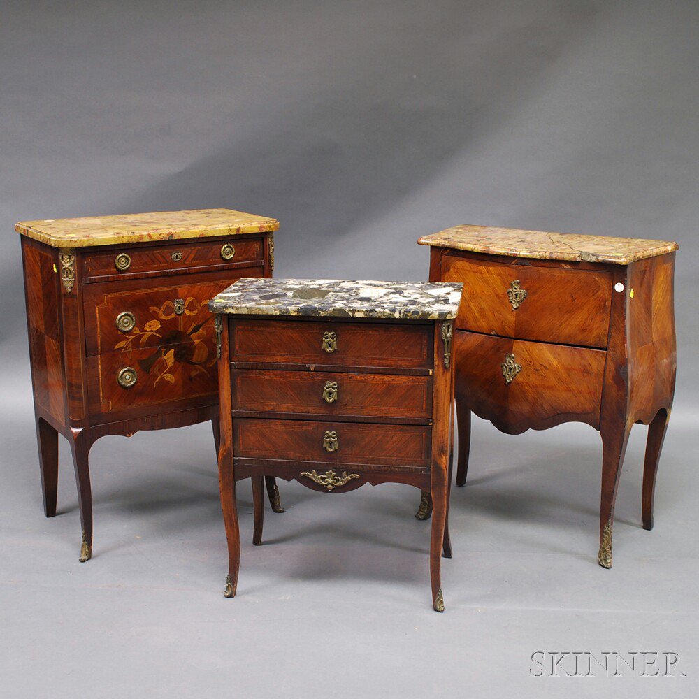 Appraisal: Three Louis XV-style Marble-top Commodes each with brass mounts one