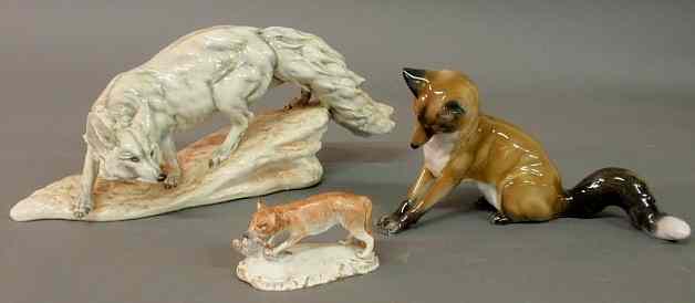 Appraisal: German porcelain fox with bird h th c Rosenthal porcelain