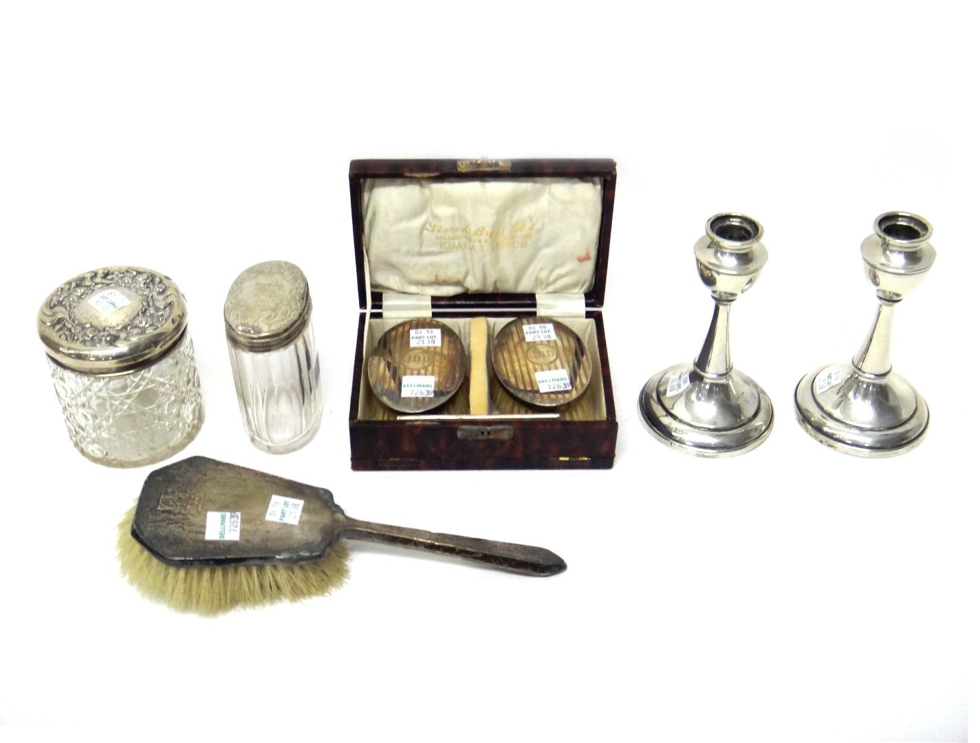 Appraisal: A pair of silver mounted oval hairbrushes and a matching