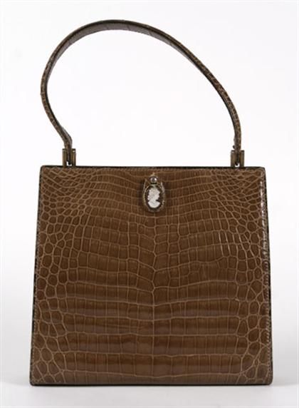 Appraisal: Taupe alligator purse s Single top handle with a cameo