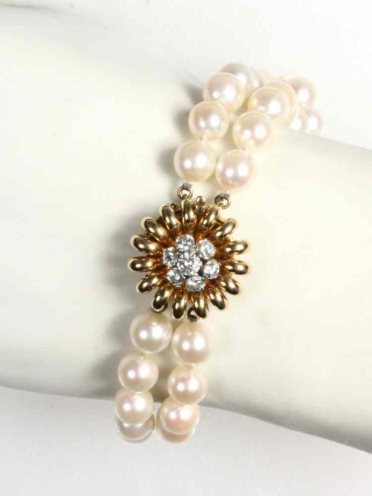 Appraisal: BRACELET - One double strand pearl bracelet with handmade kt