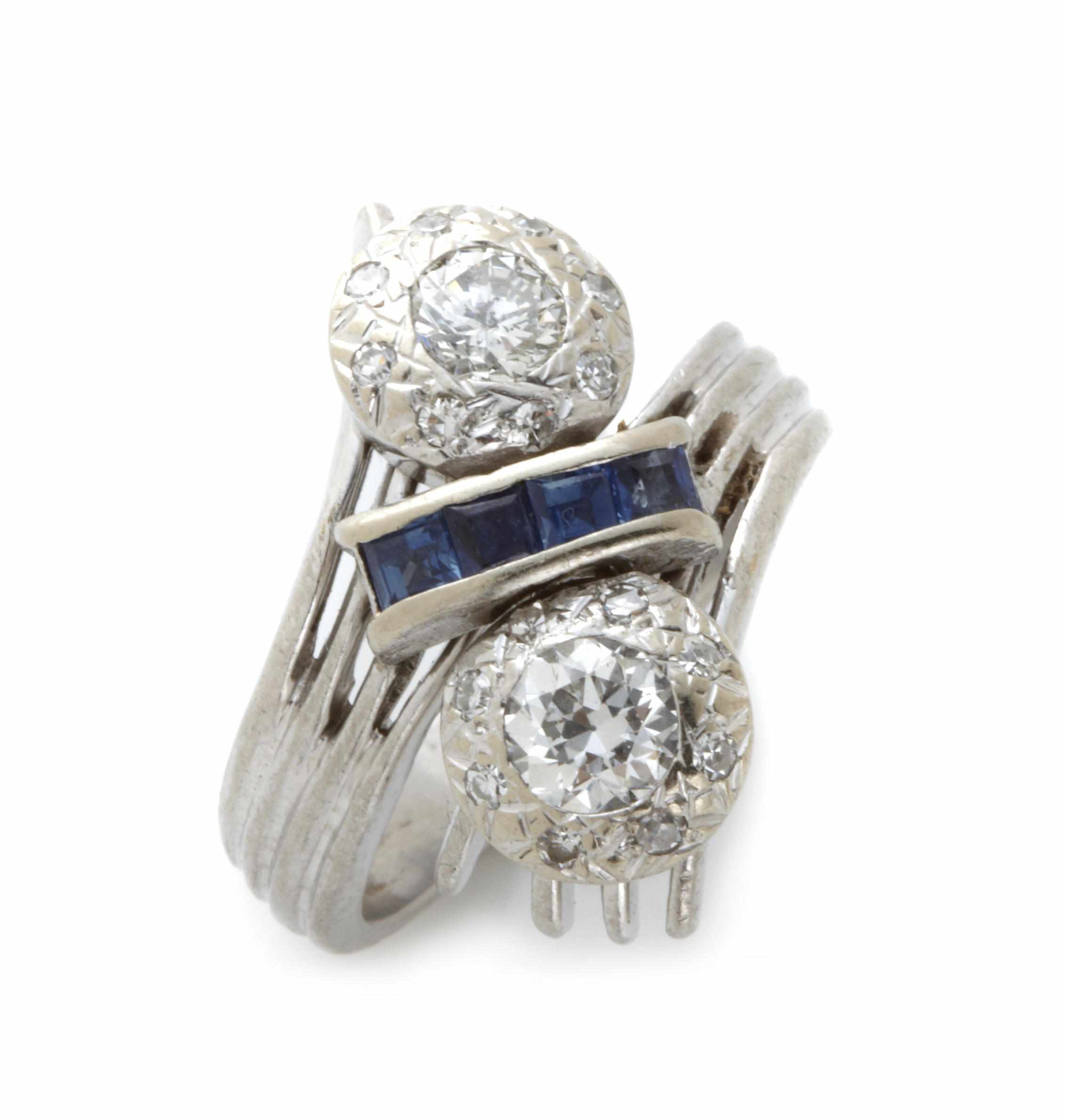 Appraisal: A diamond sapphire and platinum bypass ring size