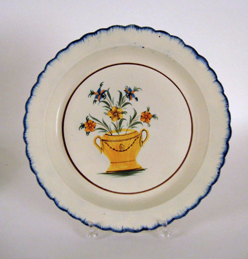 Appraisal: Leeds blue feather edge charger ca decorated with a bouquet