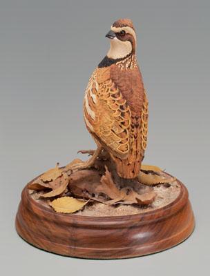 Appraisal: Finely carved and painted quail circular walnut base signed on