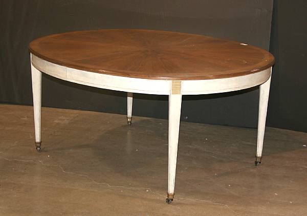 Appraisal: A Louis XVI style extension dining table with leaves