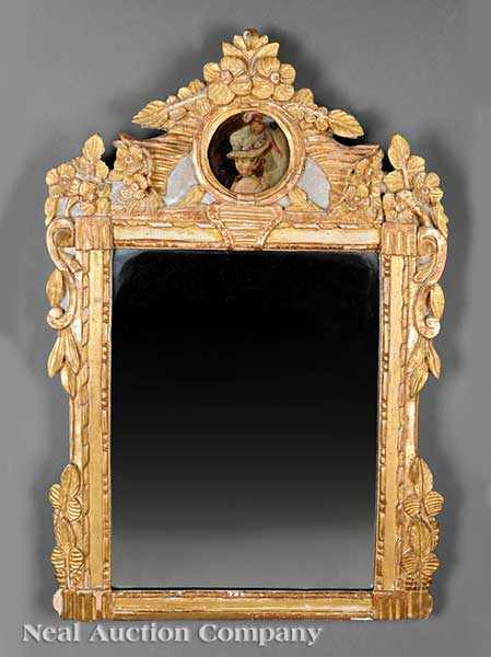 Appraisal: A Louis XVI Carved Giltwood Mirror c and later the