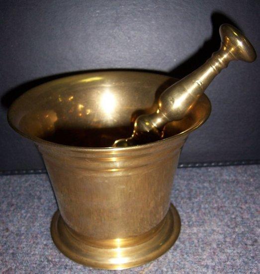 Appraisal: A brass mortar cm high and the pestle for the