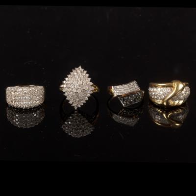 Appraisal: Four diamond dress rings each set in ct gold sizes