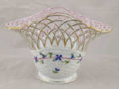 Appraisal: Herend A ceramic basket with basket weave and pierced lattice