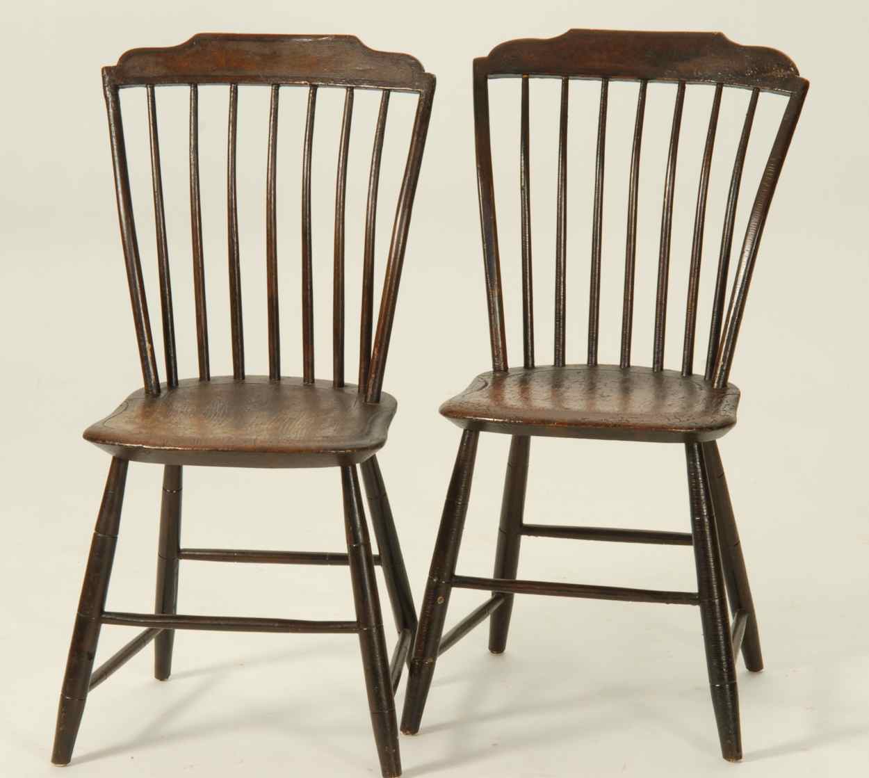 Appraisal: PAIR OF ANTIQUE AMERICAN STEPDOWN WINDSOR SIDE CHAIRS Circa In