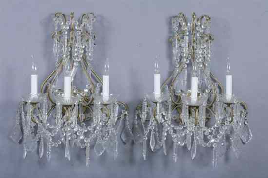 Appraisal: GEORGIAN STYLE CRYSTAL THREE-LIGHT WALL SCONCES Gilt-metal scrolling arms with