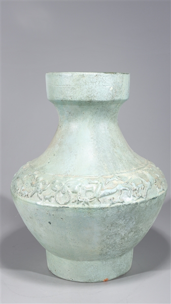 Appraisal: Chinese early style celadon glazed vase with molded designs to