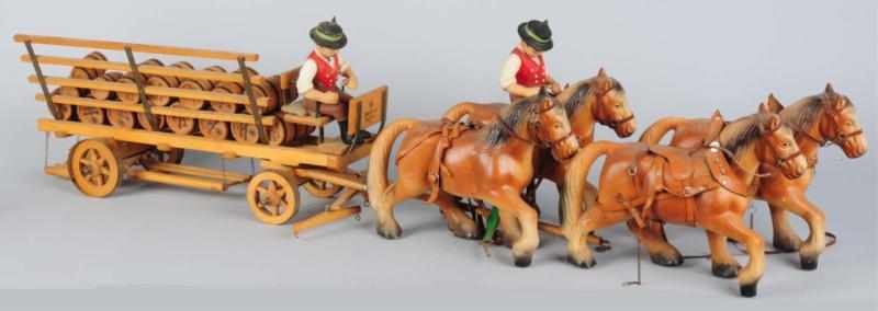 Appraisal: Wooden Beer Barrel Wagon With four horses and two riders