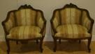 Appraisal: A pair of late th century walnut Bergeres