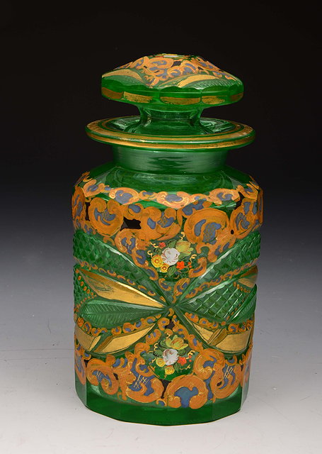 Appraisal: A BOHEMIAN GREEN GLASS CYLINDRICAL ROSE PETAL JAR AND COVER