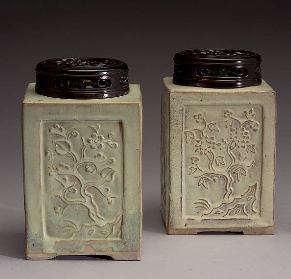 Appraisal: A pair of pottery jars Both of square section molded