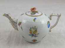 Appraisal: A Herend miniature teapot with rose finial and individual flora