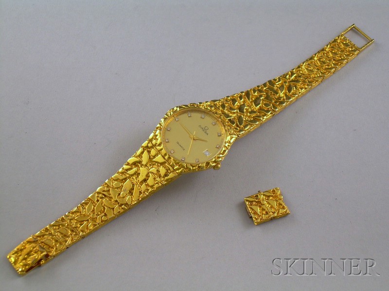 Appraisal: Lady's Gold Omega Wristwatch with a gold-tone band and two