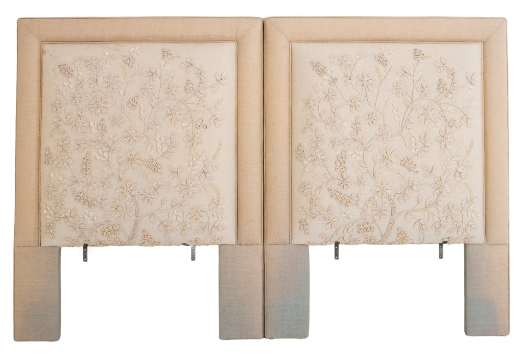 Appraisal: UPHOLSTERED LINEN AND RIBBON HEADBOARDS Upholstered headboards the pair covered