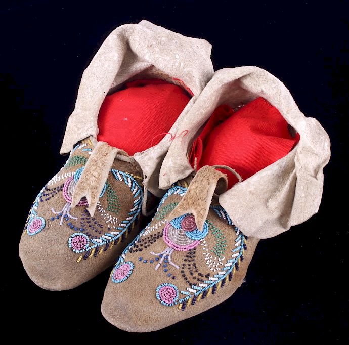 Appraisal: Santee Sioux Beaded Moccasins c - The lot features an