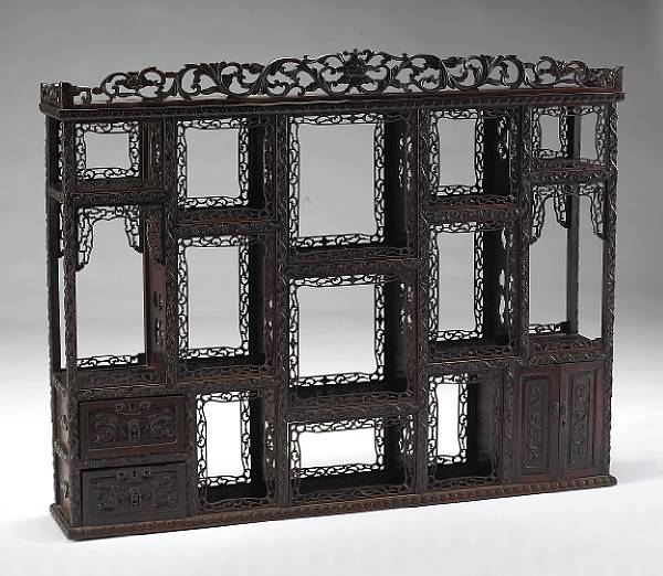 Appraisal: A mixed hardwood hanging display cabinet Late Qing Republic Period