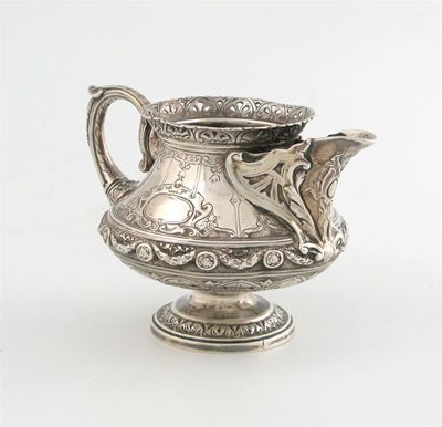 Appraisal: A Victorian silver cream jug by The Barnards London tapering