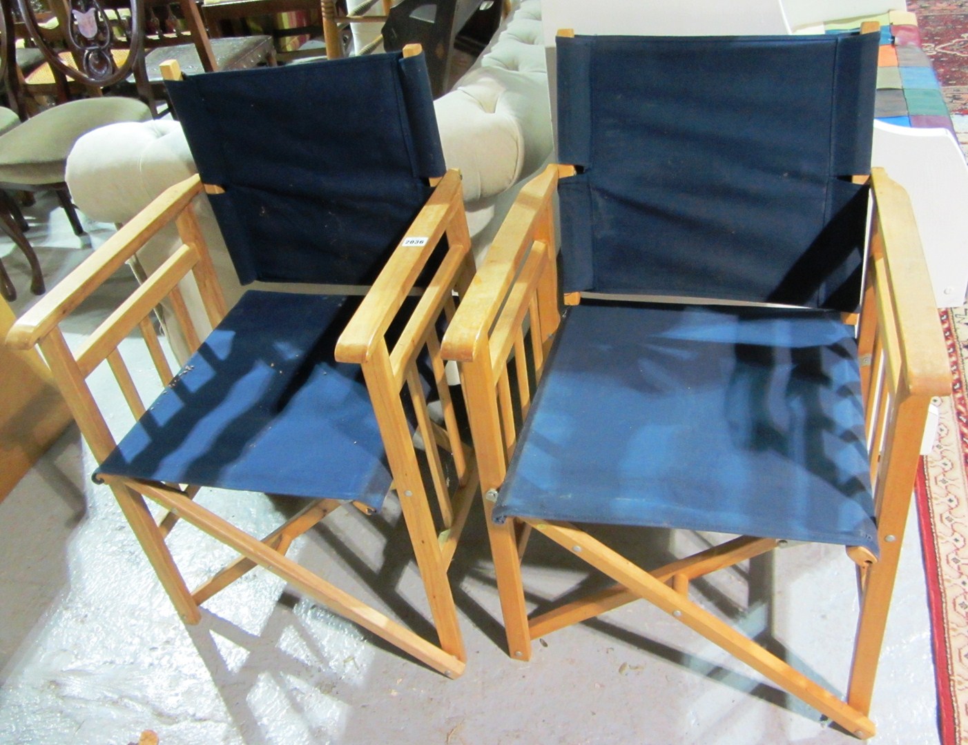 Appraisal: Two folding director's chairs