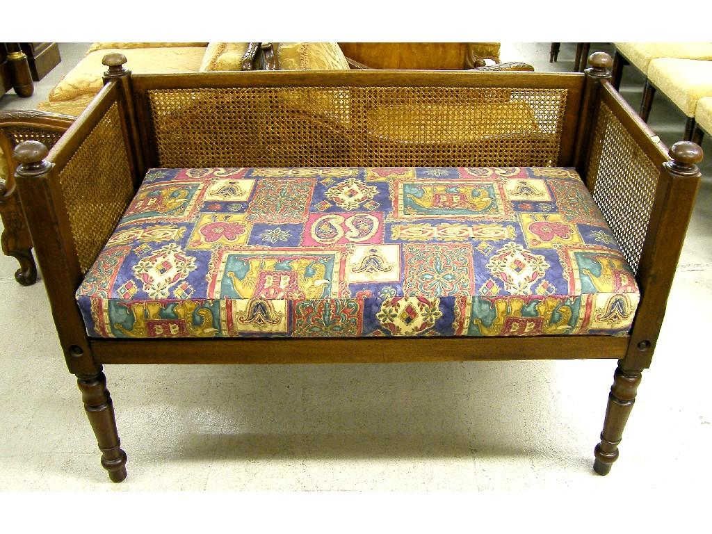 Appraisal: Victorian mahogany bergere panelled day bed supported upon turned tapering