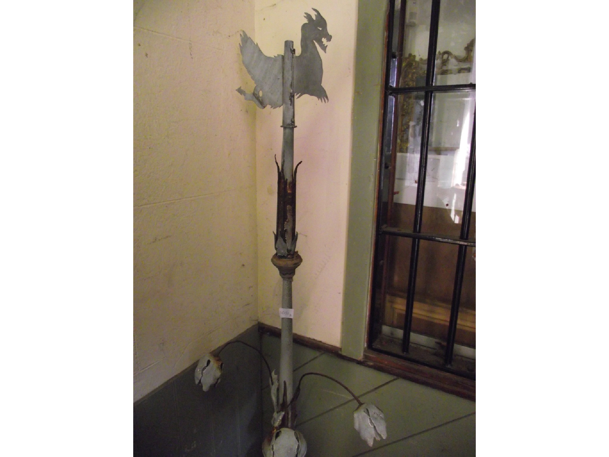 Appraisal: A weather vane finial weathered tin and grey painted with